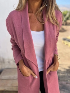 Close-up of lapel and knit texture on this dusty pink long cardigan jacket for women