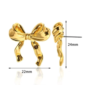 Golden bow stud earrings in brass plating, dimensions 22mm by 24mm, high polish finish