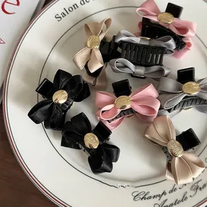 French vintage silk bow hair clips with gold relief buttons in four elegant colors