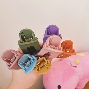 Set of large colorful matte hair clips in pastel Morandi shades for daily styling