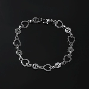 Polished stainless steel bracelet with silver heart-shaped links and lobster clasp