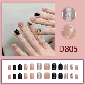 Faux ongles carrés courts avec motifs d'étoiles, strass et fini noir brillant D805
