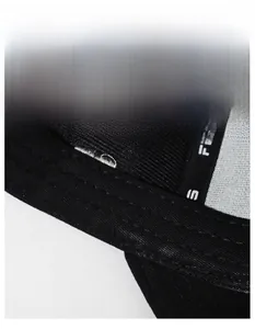 Macro detail of breathable widened sweatband and stitching inside the black baseball cap