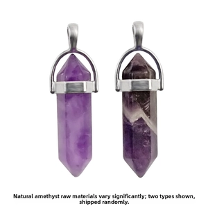 Macro detail of natural hexagonal amethyst crystal pendants with silver metal clasps