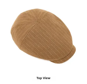 Vue de dessus d'une casquette gavroche marron à rayures, texture de tissu détaillée