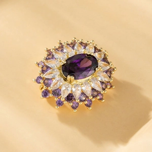 Macro view of flower-shaped ring with large oval purple stone and zircon petals