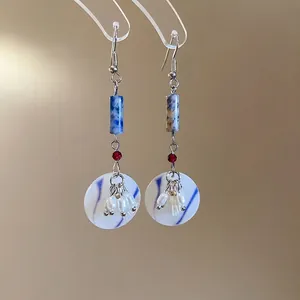 Vintage style geometric long tassel earrings with blue marble stone, resin disc, and pearls
