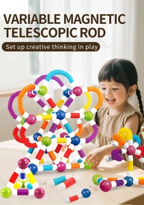 Macro shot of colorful magnetic telescopic rods and spheres building a carousel structure