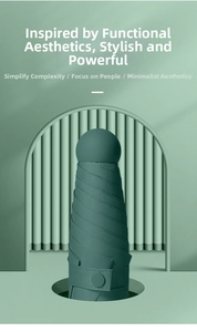 Close-up of compact dark green folding umbrella with spherical handle in a minimalist set