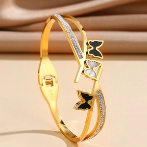 Luxurious gold stainless steel butterfly cuff bracelet with sparkling cubic zirconia accents