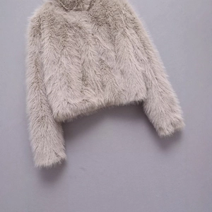 Short taupe faux fur jacket with high-density plush texture and chic minimalist style