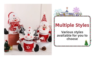 Detailed view of Christmas plush gift boxes featuring Santa, reindeer, and snowman designs