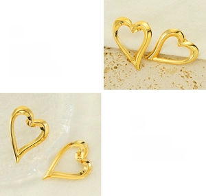 Detailed view of polished gold-plated hollow heart earrings with smooth mirror finish