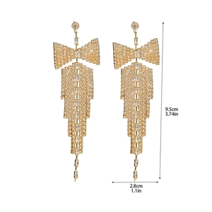 Detailed dimensions of long gold tassel butterfly earrings, 9.5cm length by 2.8cm width