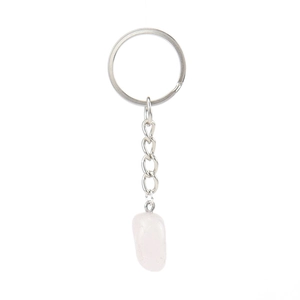 Detailed view of irregular pink agate crystal pendant with silver metal keychain ring