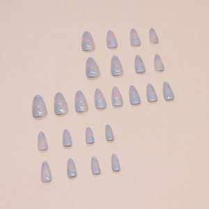 Blue-purple gradient almond press-on nails with silver star and moon glitter patterns