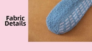 Macro shot of blue coral fleece socks with white anti-slip silicone dots on the sole