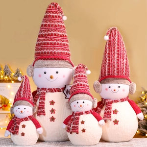 Detailed plush Christmas snowman set with knitted hats and starry button accents