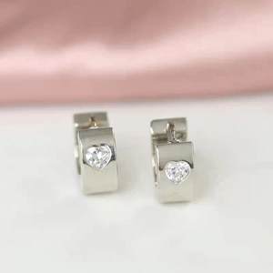 Silver heart zircon hoop earrings with polished rectangular band in a gift setting