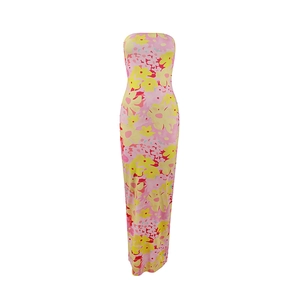 Detail of a floral strapless maxi dress featuring pink fabric and yellow flower patterns