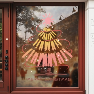 Autocollant de sapin de Noël coloré avec texte festif sur une porte vitrée décoration