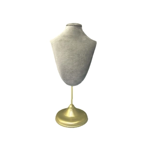 Grey velvet necklace bust display stand with golden metal support and round base for jewelry