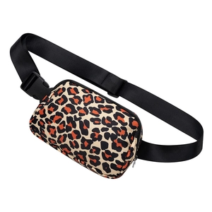 Close-up of leopard print waist bag featuring adjustable black strap and secure buckle