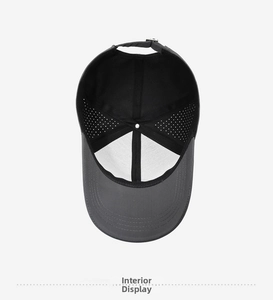 Detail view showing laser-cut ventilation holes and reinforced stitching on a grey sports cap