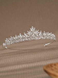 Macro detail of bridal crown with silver leaves and sparkling marquise rhinestones