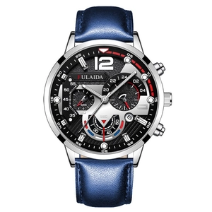 Close-up of FULAIDA quartz watch with blue leather strap and silver metal case detail