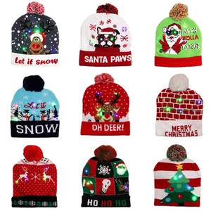Set of 9 LED knitted Christmas hats with colorful festive patterns and soft pompom tops