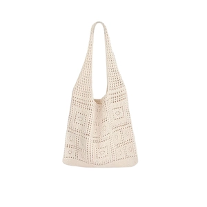 Hollow knit tote bag in ivory white featuring vintage floral crochet patterns for women