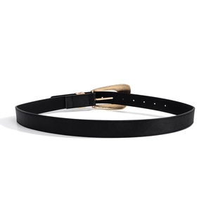Detail of black cross-grain leather belt with a golden irregular shaped metal buckle
