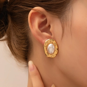 Vintage gold hammered metal stud earrings with large white oval faux pearl for women