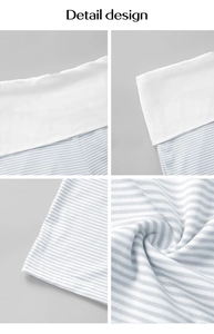 Detailed view of blue and white striped fabric texture and premium waistband stitching