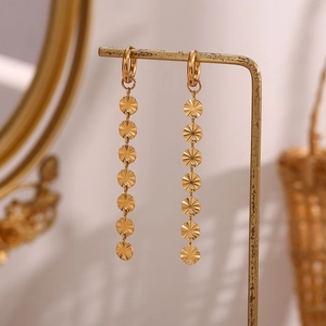 Detail of 18K gold plated stainless steel long chain earrings with snowflake leaf fringe