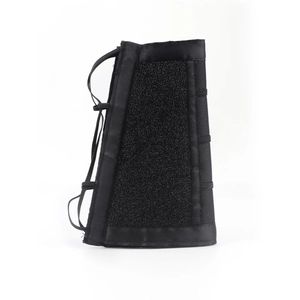 Tactical black nylon cheek rest with hook and loop surface and adjustable elastic cords