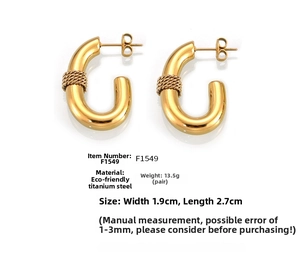Macro view of gold-plated twisted U-shaped titanium steel earrings showing size details