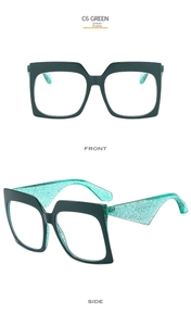 Detailed front and side views of C6 green oversized fashion glasses with glitter temples