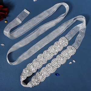 Sparkling rhinestone bridal sash belts with wave pattern on elegant blue background