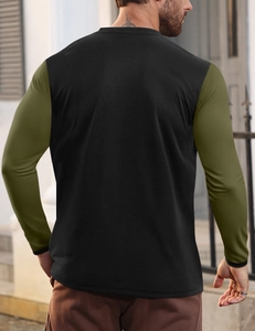 Rear view of minimalist long-sleeve Henley shirt featuring black body and olive green sleeves
