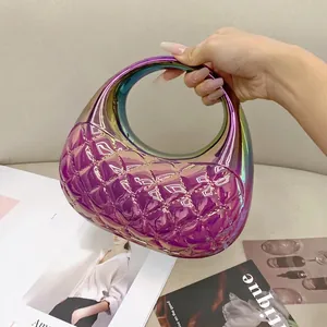 Detailed close-up of holographic purple acrylic clutch bag with quilted diamond pattern