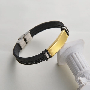 Men's hip-hop PU leather braided bracelet with a curved gold metal plate and silver clasp