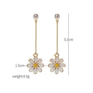 Detail view of daisy drop earrings showing 5.3cm length and 1.5cm flower diameter