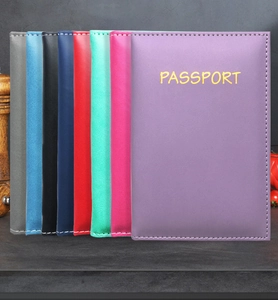 Detailed collection of slim PU leather passport covers in multiple vibrant colors for travel