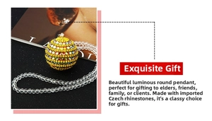 Luminous Christmas car pendant featuring yellow rhinestones and faceted clear beads