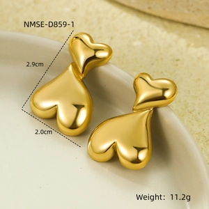 Detailed view of gold heart stud earrings with dimensions 2.9cm and 2.0cm and weights