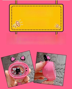 Detail view of a pink retro TV keychain featuring liquid sand, cat ears, and a black cat figure