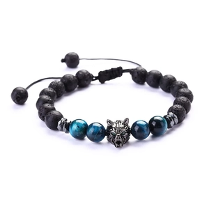 Close-up of adjustable bead bracelet with metal wolf head, tiger eye and lava stones
