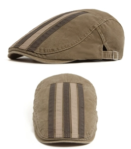 Detail view of washed vintage flat cap with stitched stripes and metal side buckle